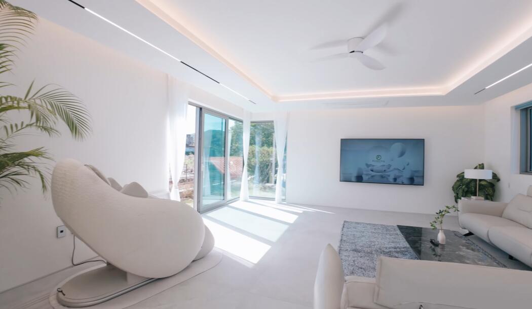 Bright white living room seen from an FPV drone